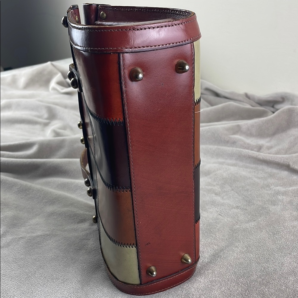 Vintage Brown Satchel with Structured Design and Metal Accents - Picture 10 of 15
